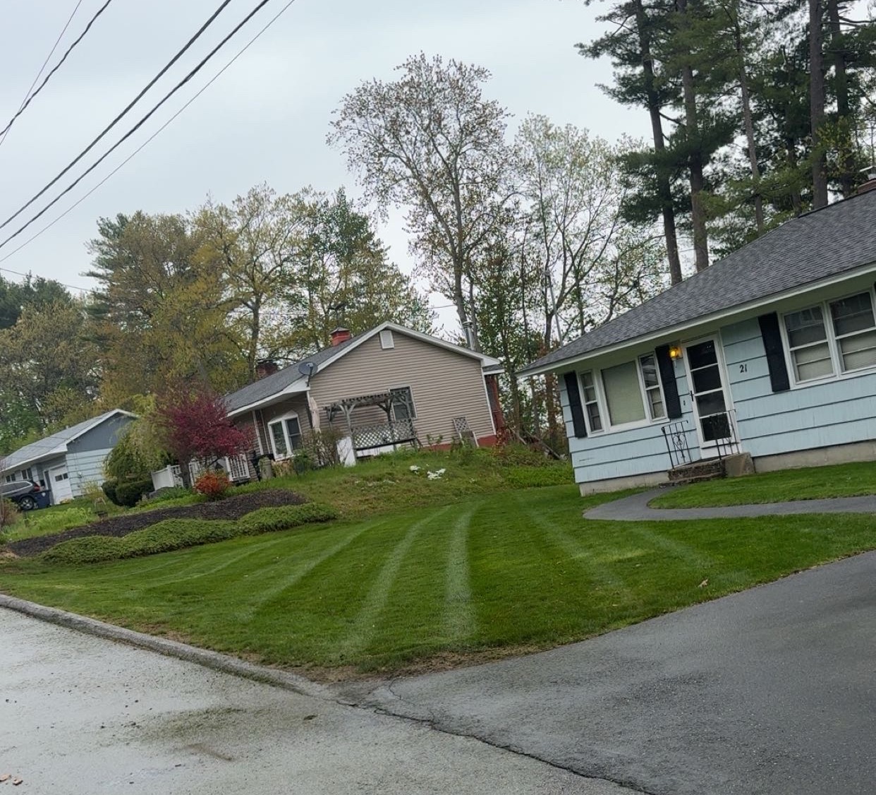 R&A Landscaping crew working on a residential yard